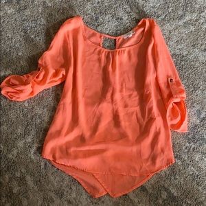 Coral colored shirt
